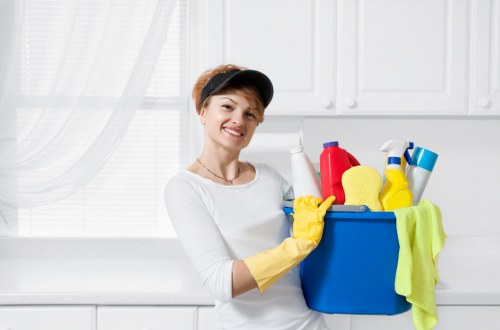 Carpet cleaning technician reviewing safety procedures on site